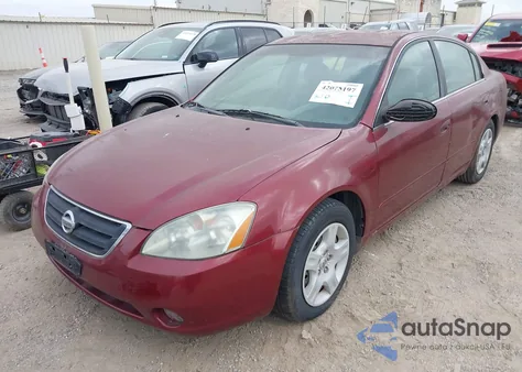 2002 Nissan Altima 2.5 S z USA, uszkodzony, nr VIN 1N4AL11D52C279004